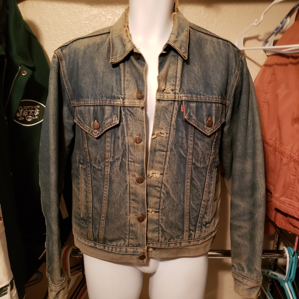 Vintage Levi's medium denim trucker jacket worn distressed blue